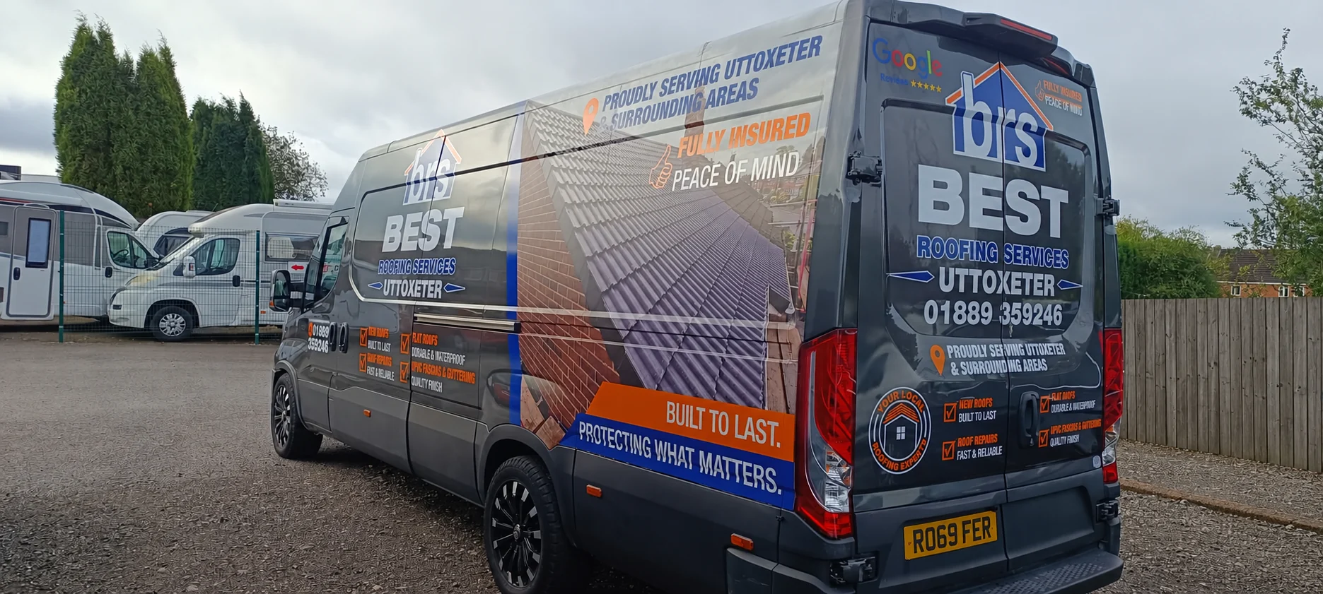 Best Roofing Services wrapped van with timber fencing in the background