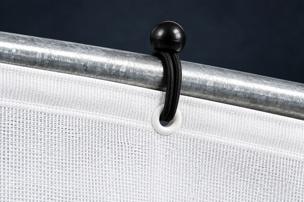 Hemmed edge & eyelets