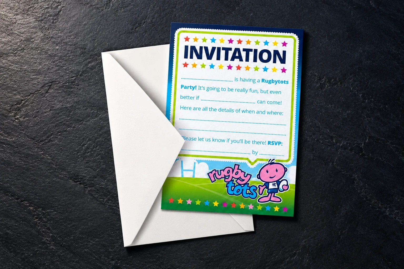 Rugbytots party invitation on a flat card with a white envelope