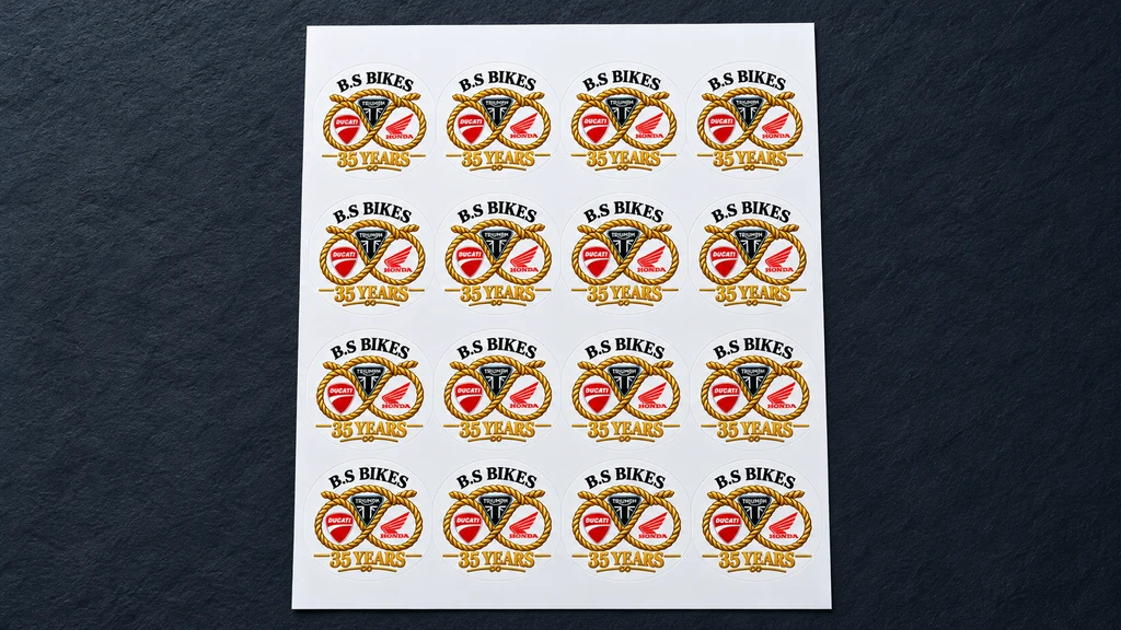 A4 sheet with 16 B.S Bikes anniversary vinyl labels in a four-by-four layout